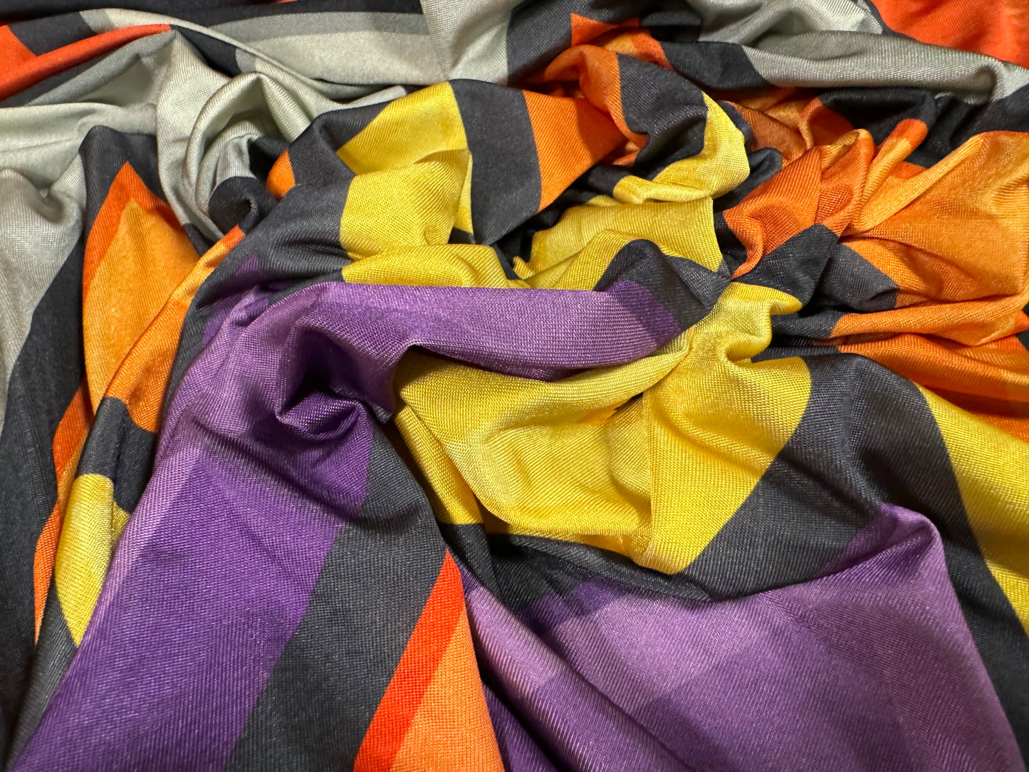 Soft touch stretch spandex single jersey fabric, per metre - jumbo chevron print - orange yellow & purple