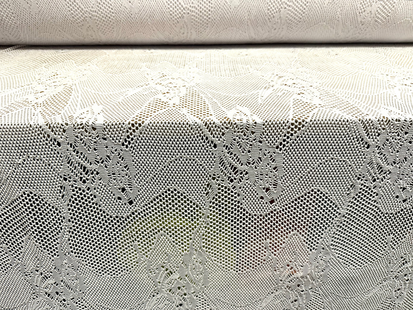Stretch fishnet jersey fabric with floral design, per metre - white