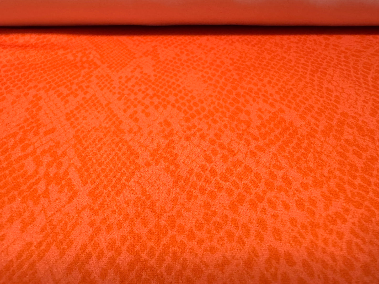 Scuba crepe stretch spandex jersey dress fabric, per metre - snakeskin print - orange