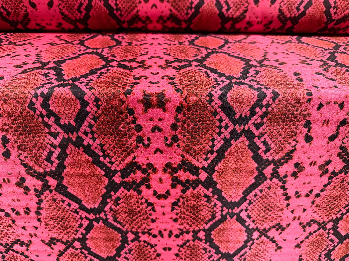 Shantung satin faux silk woven dress fabric, per metre - snakeskin print - cerise pink