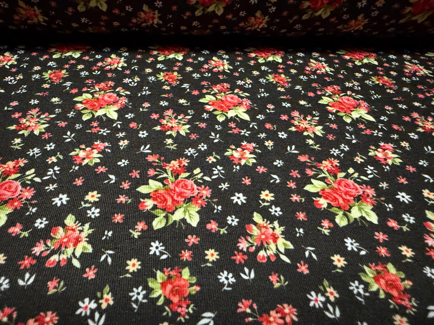 Soft handle stretch single jersey fashion fabric, per metre - ditsy rose print - black & red
