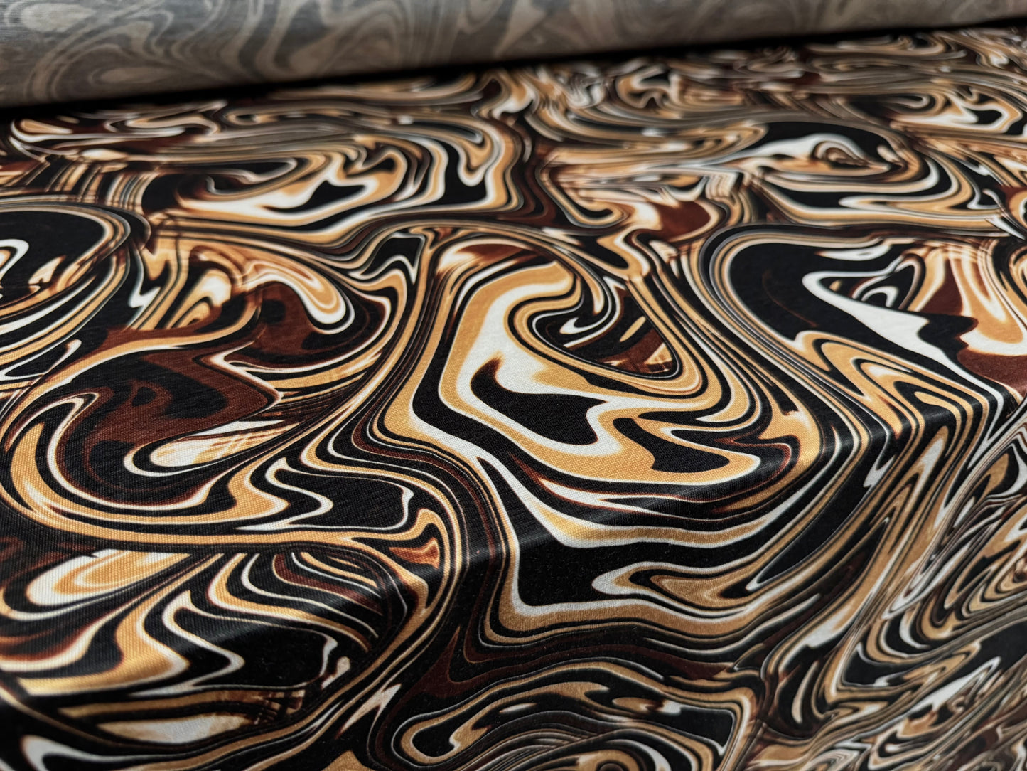 Soft handle single jersey fashion fabric, per metre - 60s swirl print - brown & beige