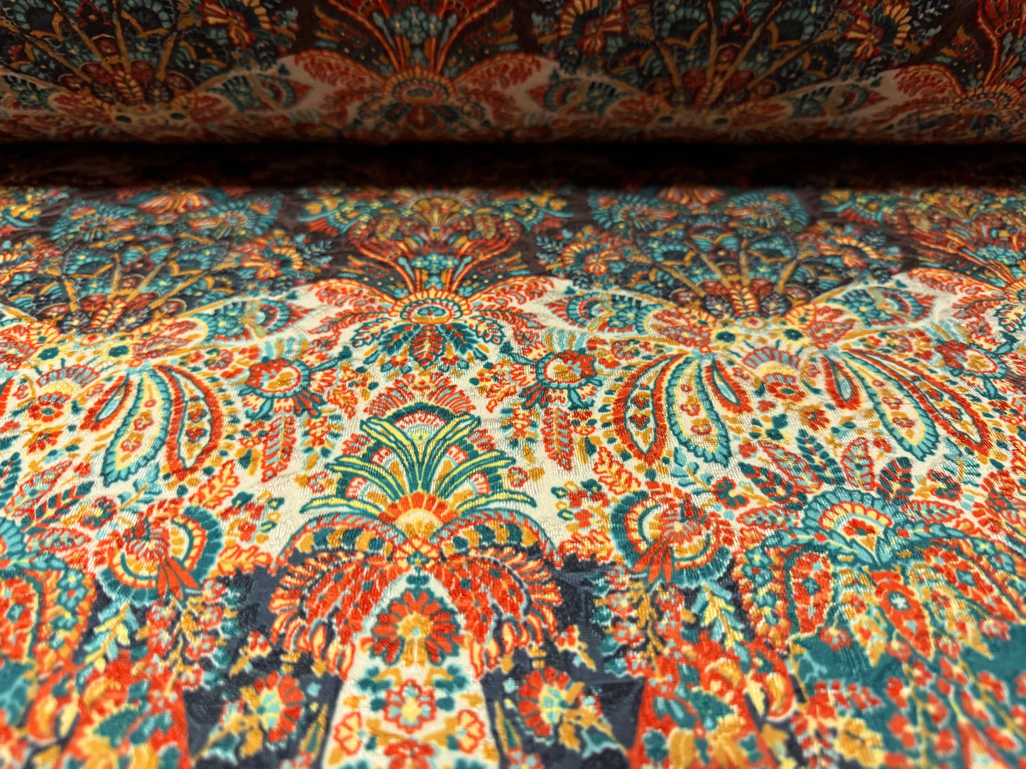 Stretch spandex jersey jacquard fabric, per metre - stylised paisley print - cream orange & turquoise