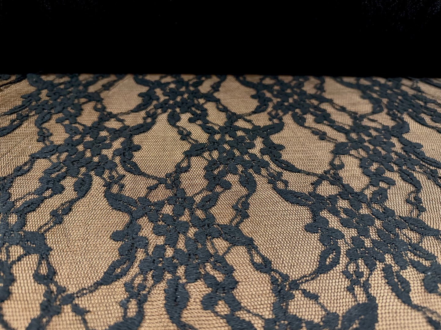 Floral lace fabric with decorative borders, per metre - black