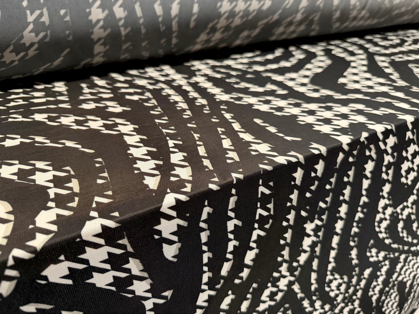 Power mesh net stretch spandex fabric, per metre - houndstooth swirl print - black & white