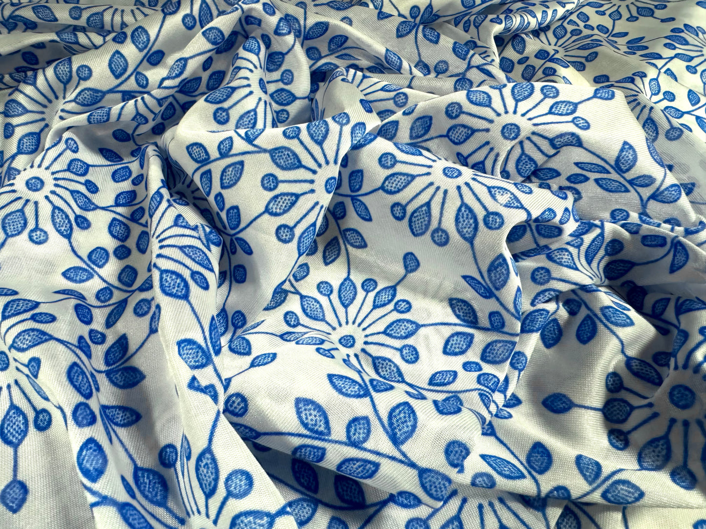 Angelique lightweight sateen jersey fabric, per metre - stylised flower print - white & cobalt blue