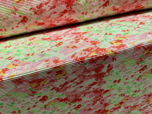 Stretch plissé pleated satin dress fabric, per metre - stylised floral print - pink red & green