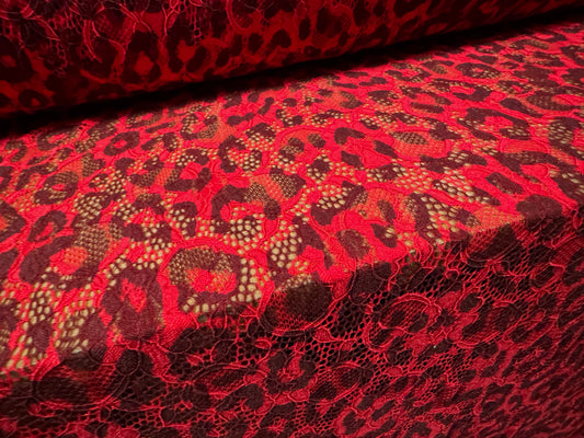 Stretch lace dress fabric with scalloped selvedge, per metre - cheetah animal print - red & brown