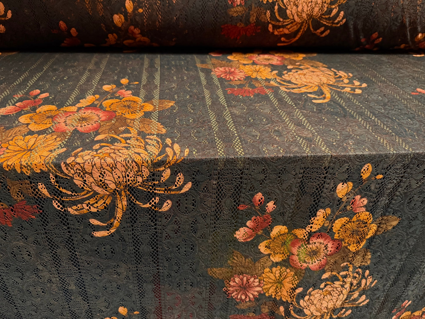 Soft handle crochet lace knit fabric, per metre - Asian Chrysanthemum print - ebony & peach