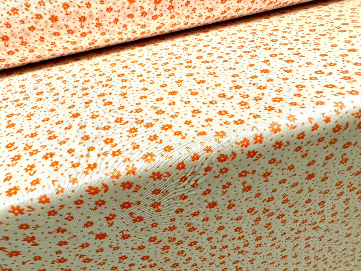 Angelique lightweight sateen jersey fabric, per metre - ditsy floral print - orange & white