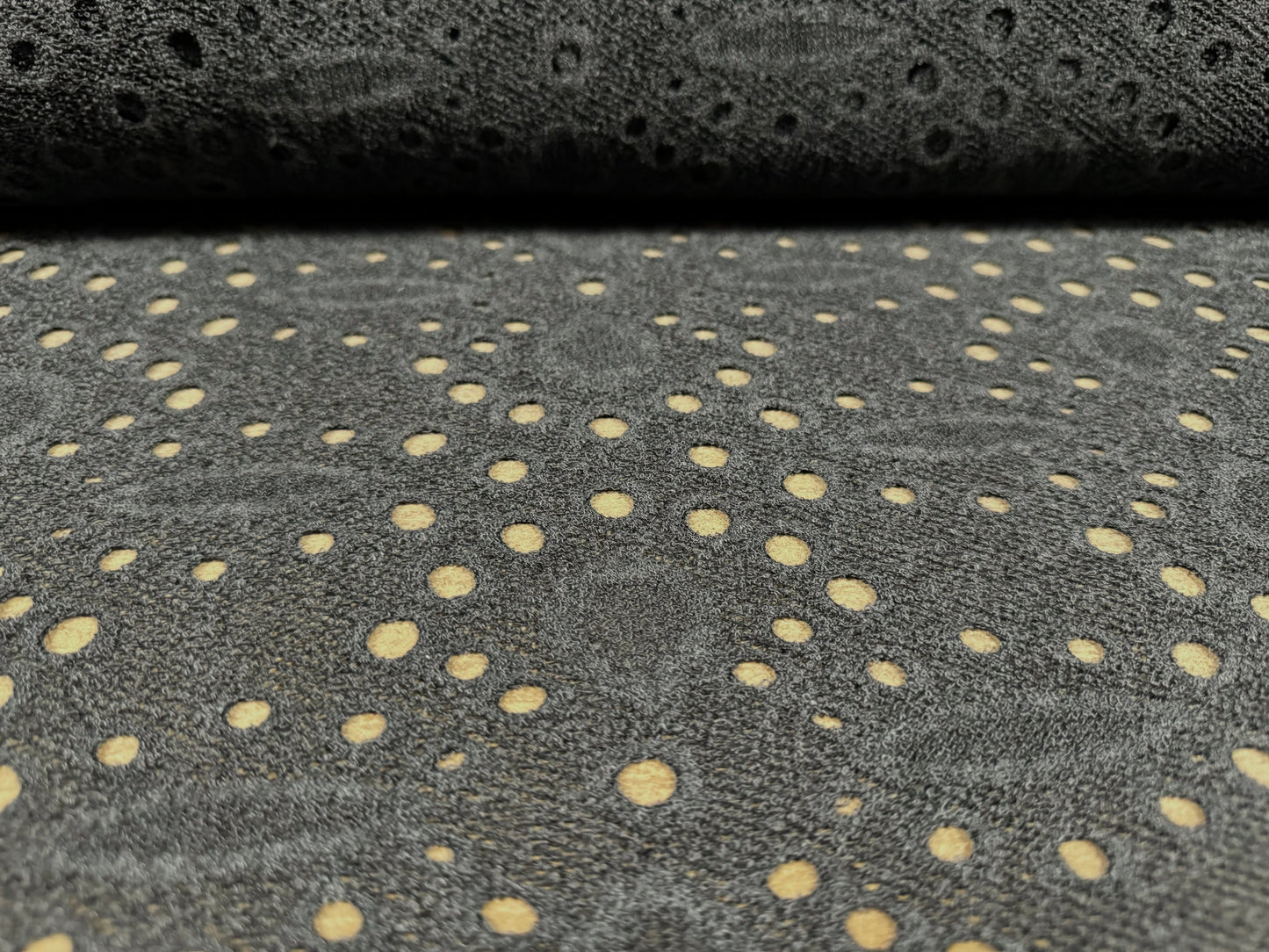 Eyelet jersey dress fabric, per metre - stylised flower - charcoal grey