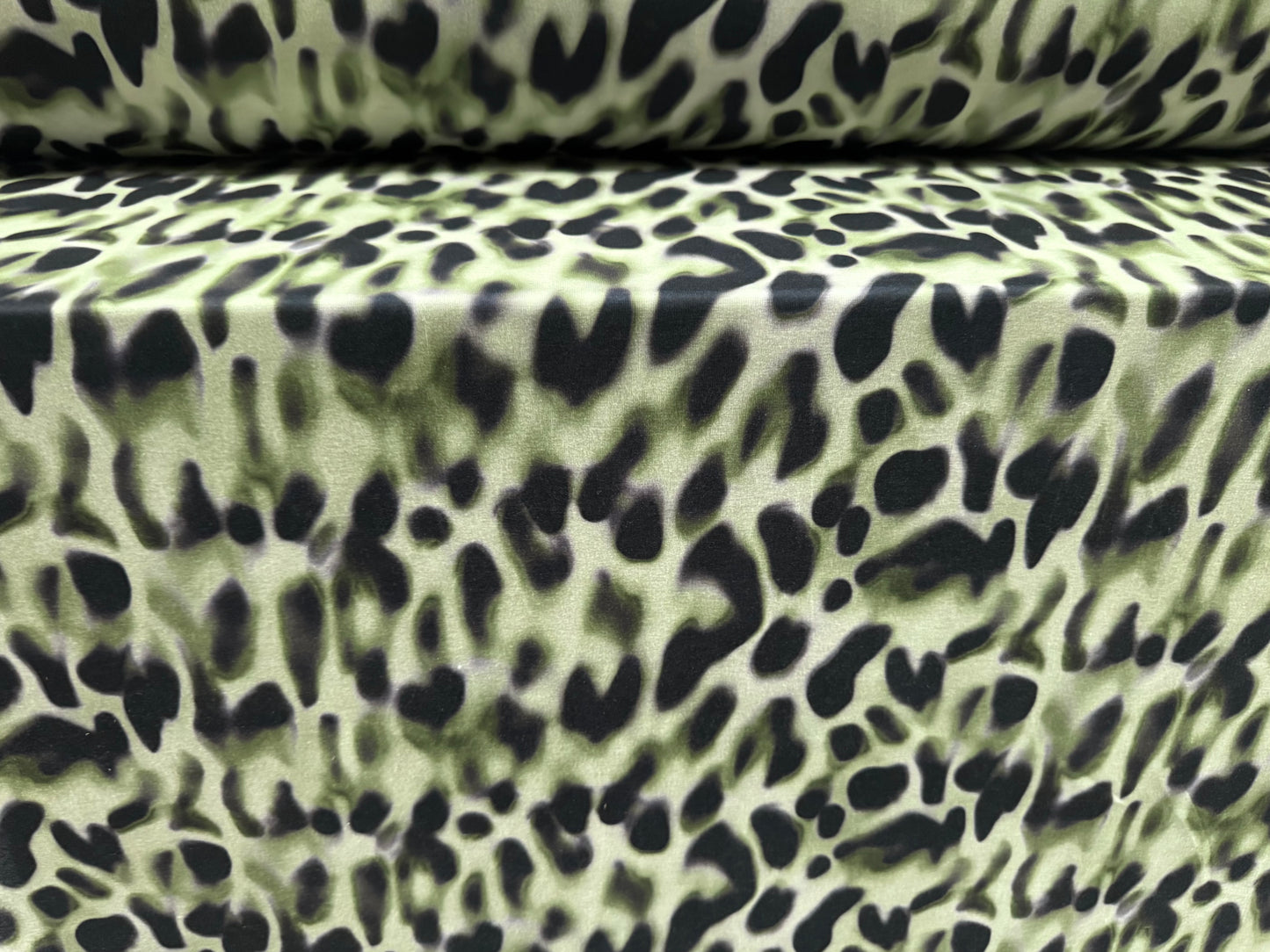 Stretch spandex interlock jersey fabric, per metre - leopard smudge print - sage green