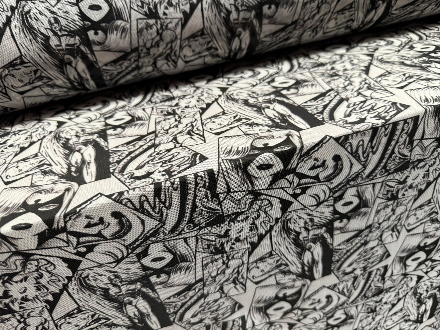 Power mesh net stretch spandex fabric, per metre - superhero cartoon print - black & white