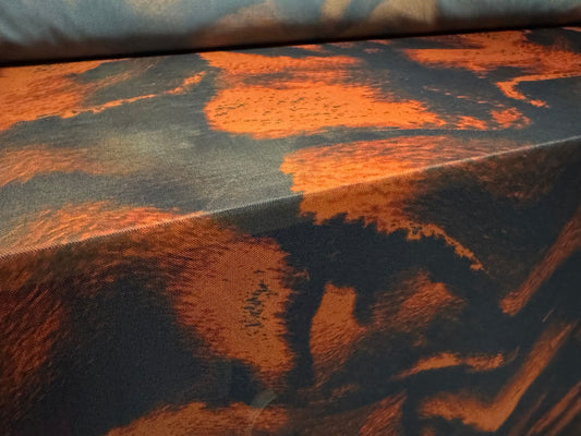 Power mesh net stretch spandex fabric, per metre - molten lava print - black & dark orange