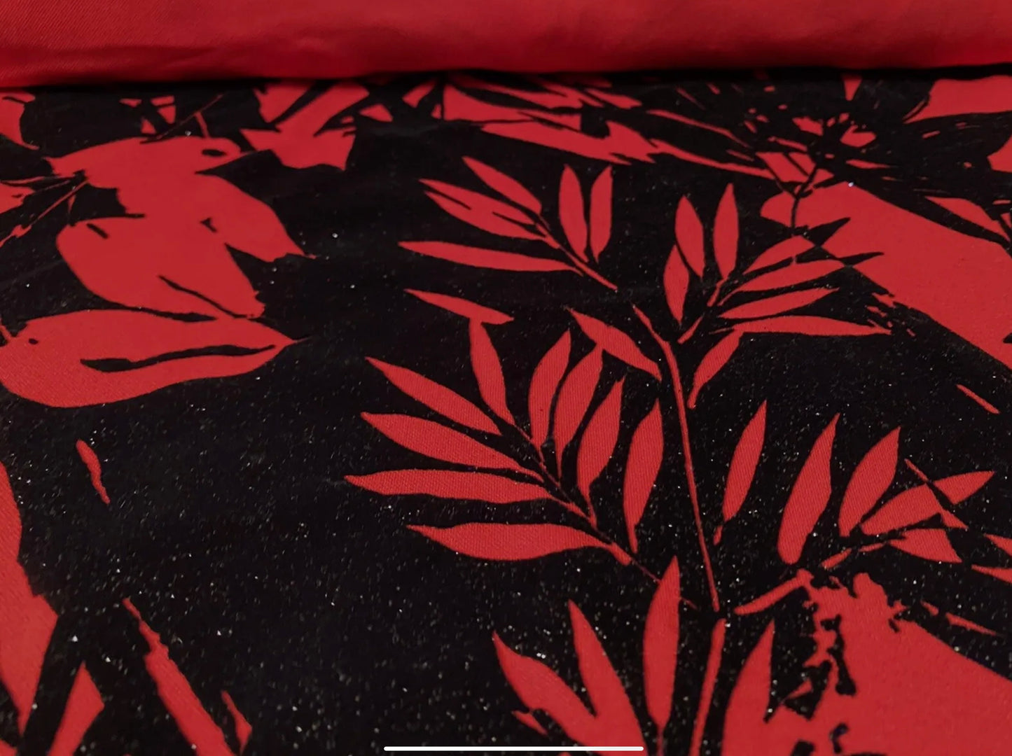 Stretch spandex double jersey fabric, per metre - jungle leaf print with glitter sparkle - red & black