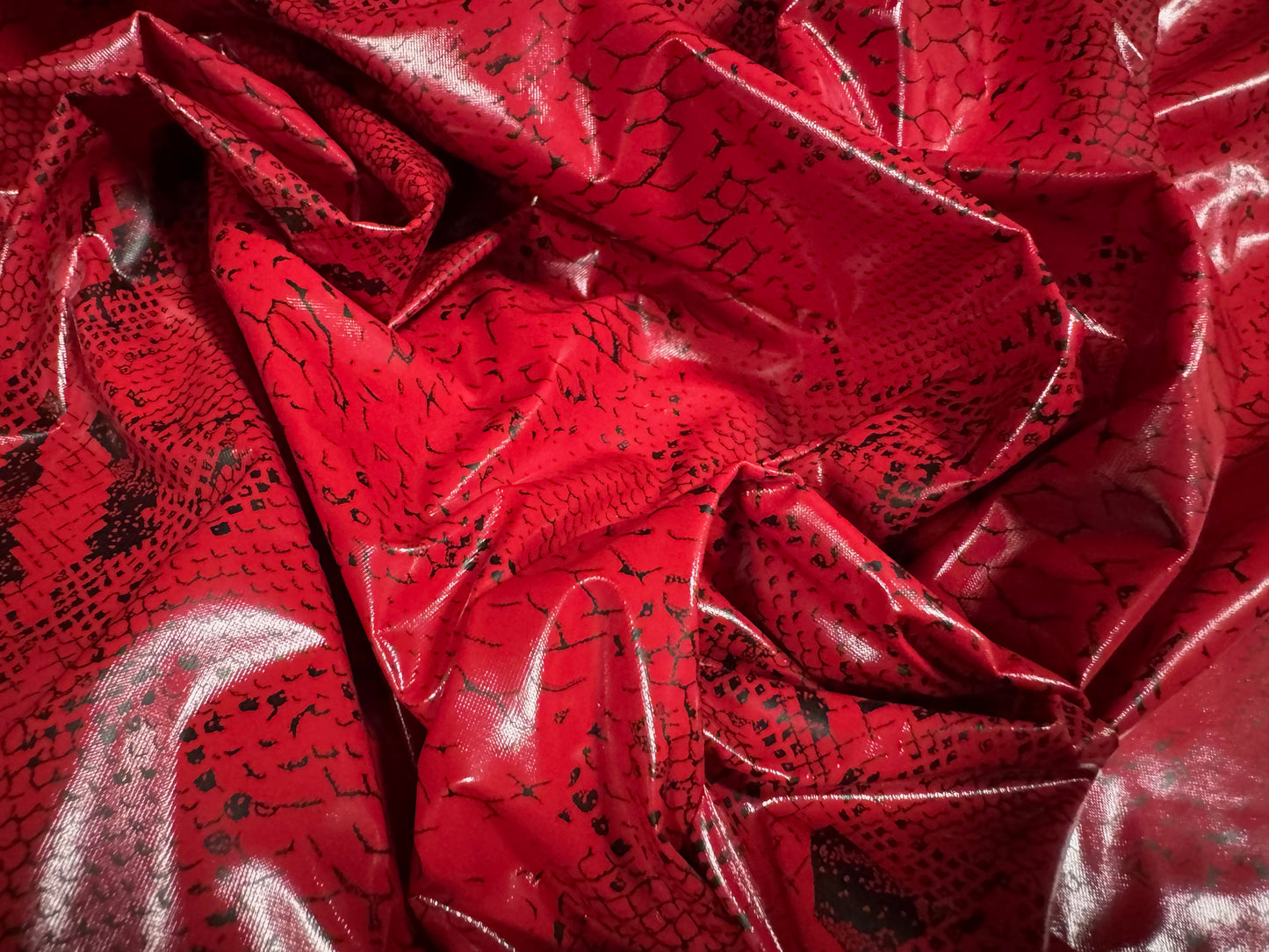 High gloss faux leather p.u. coated jersey fabric, per metre - snakeskin print - red