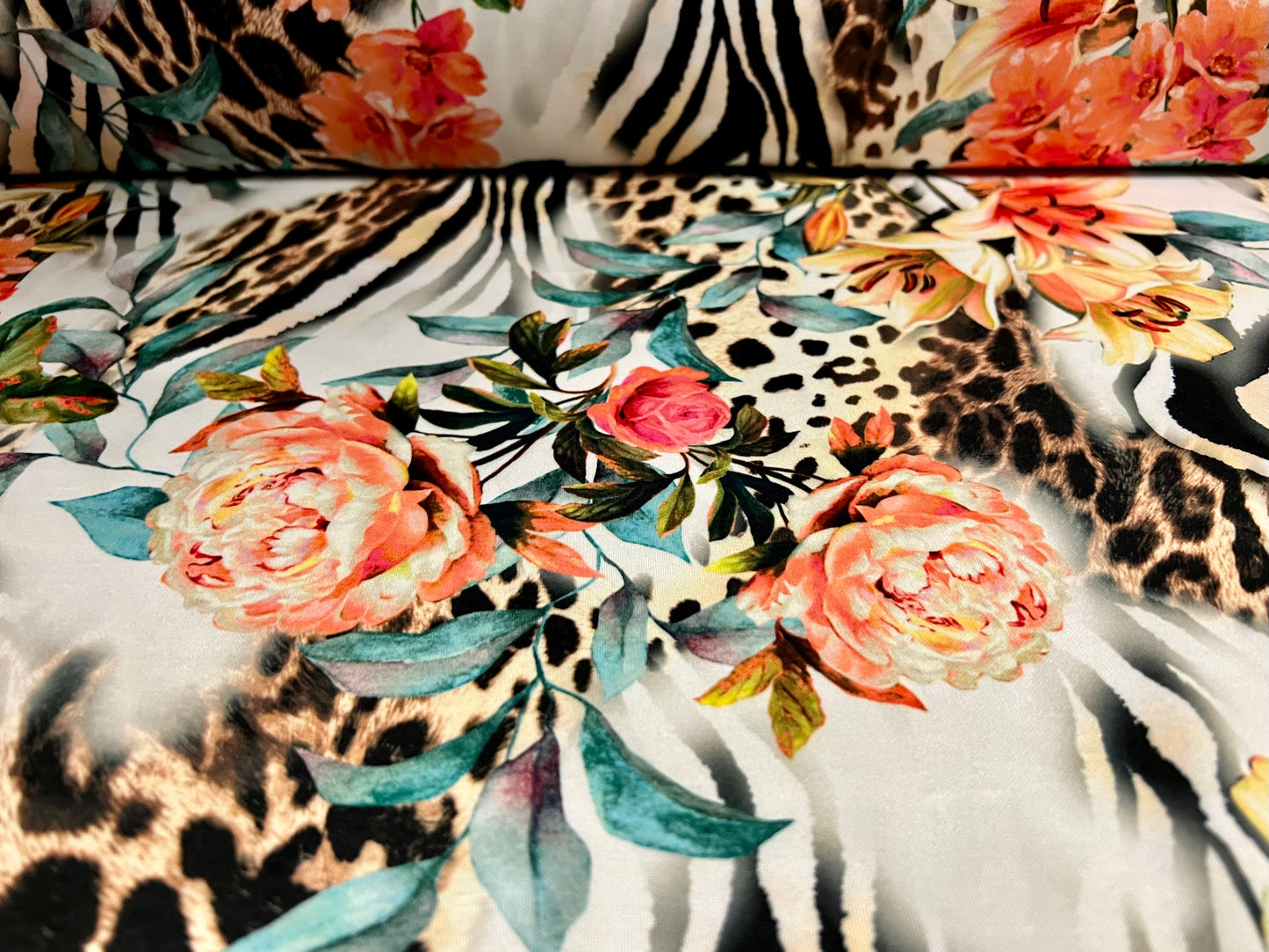 Stretch spandex jersey fabric with crepe back, per metre - lily flower & animal fusion print