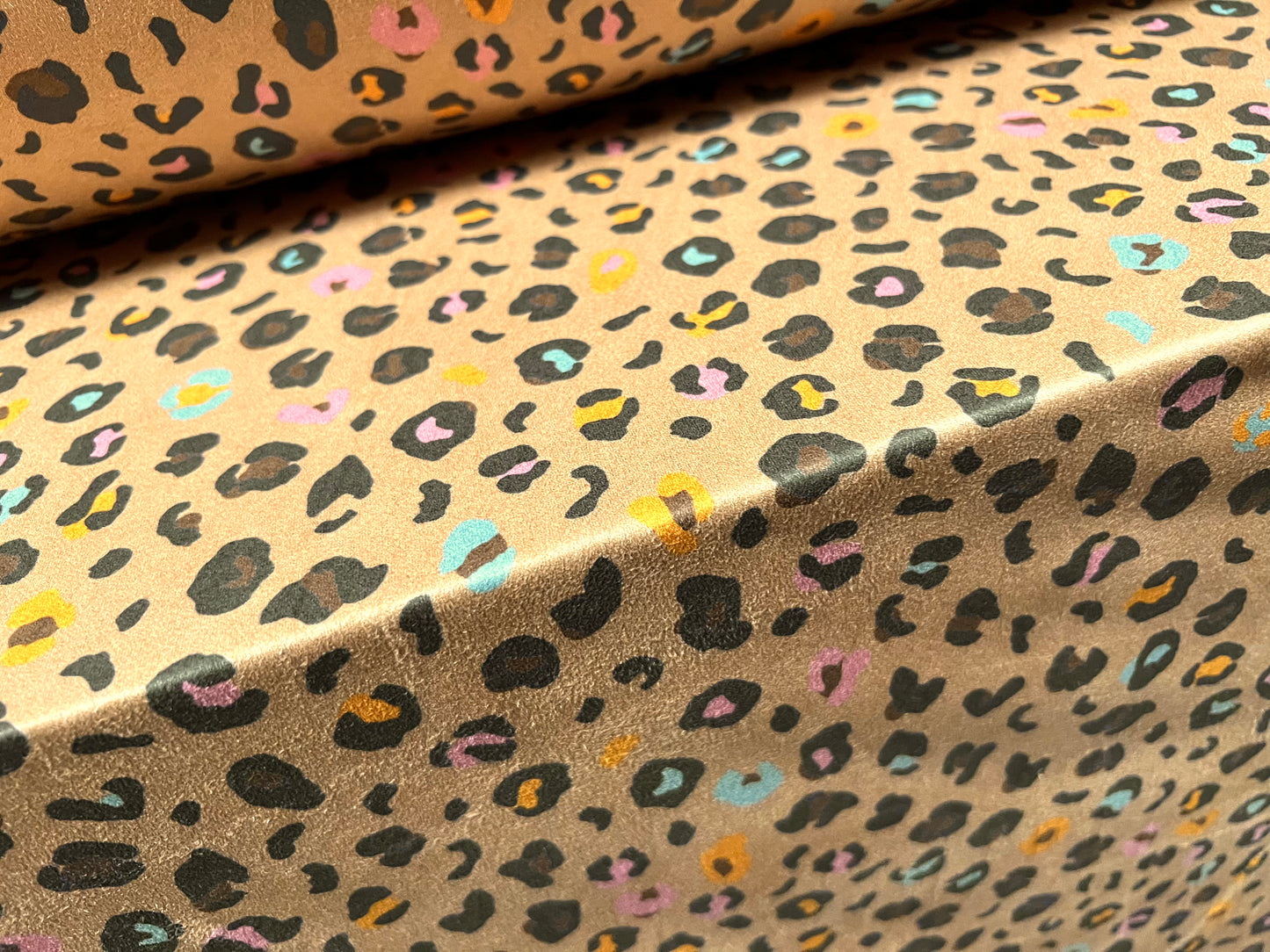 Faux suede stretch spandex jersey fabric, per metre - funky leopardskin print - light brown pink & blue