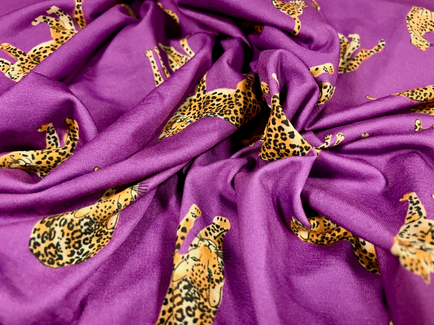 Soft handle stretch single jersey fabric, per metre - cheetah animal print - purple & gold