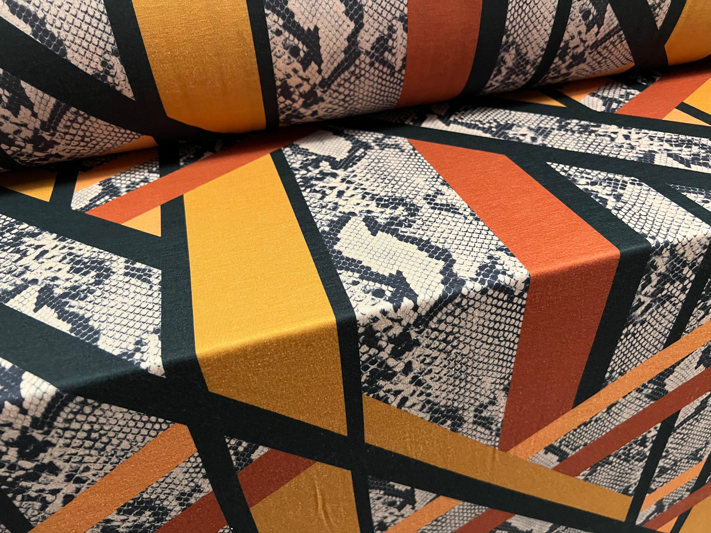 Soft handle single jersey fashion fabric, per metre - retro snakeskin geometric stripe print - saffron & brown