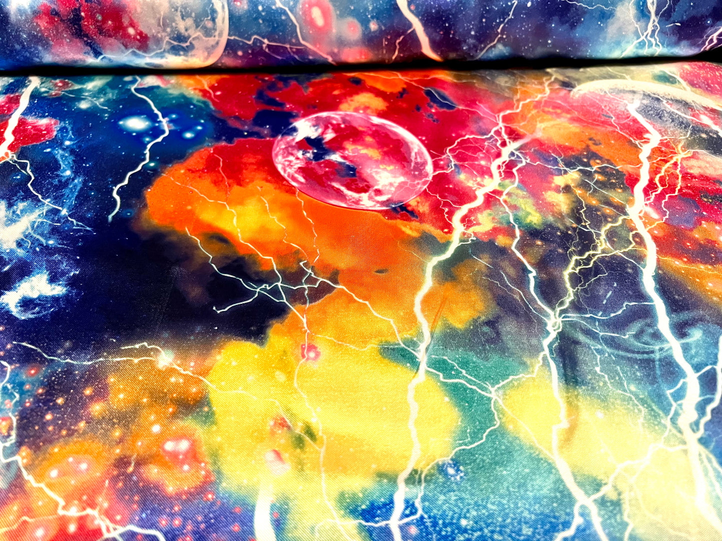 Silky Satin woven dress fabric, per metre - cosmic lightning print - multicolour