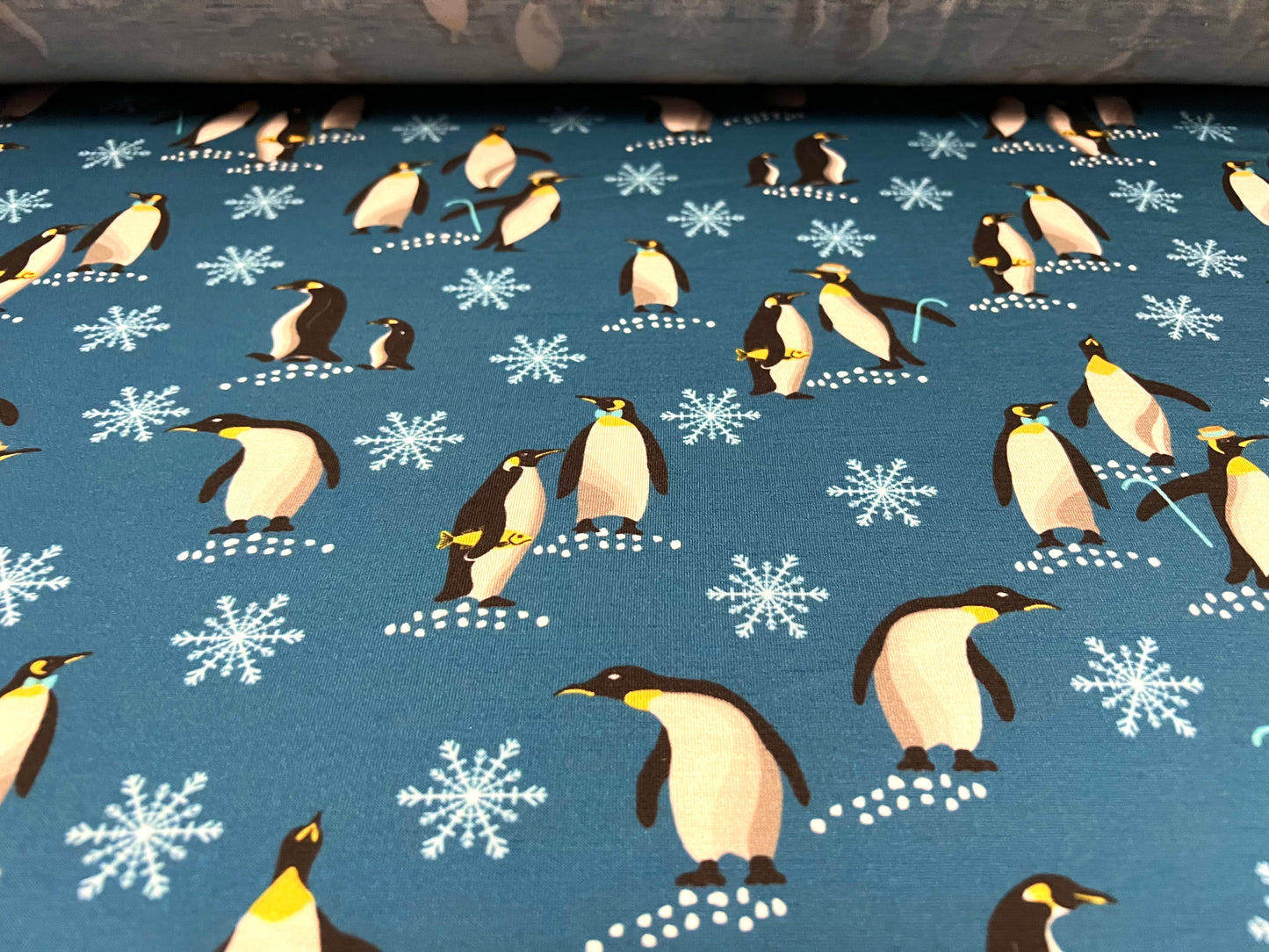 Soft handle stretch single jersey fabric, per metre - penguins print - dark turquoise