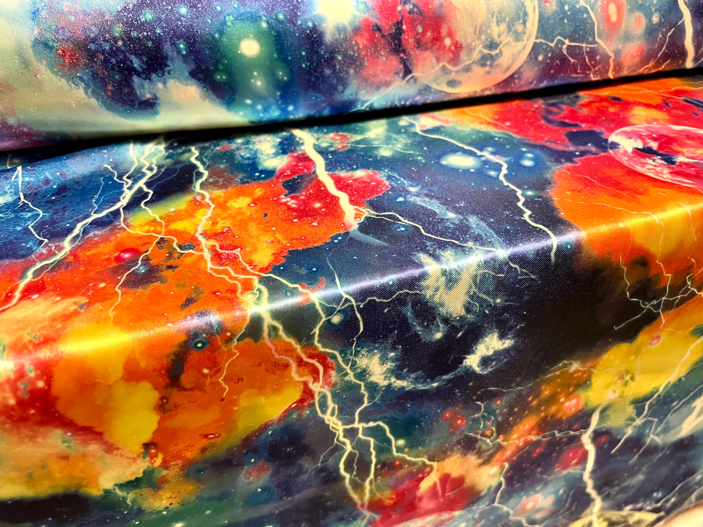 Silky Satin woven dress fabric, per metre - cosmic lightning print - multicolour