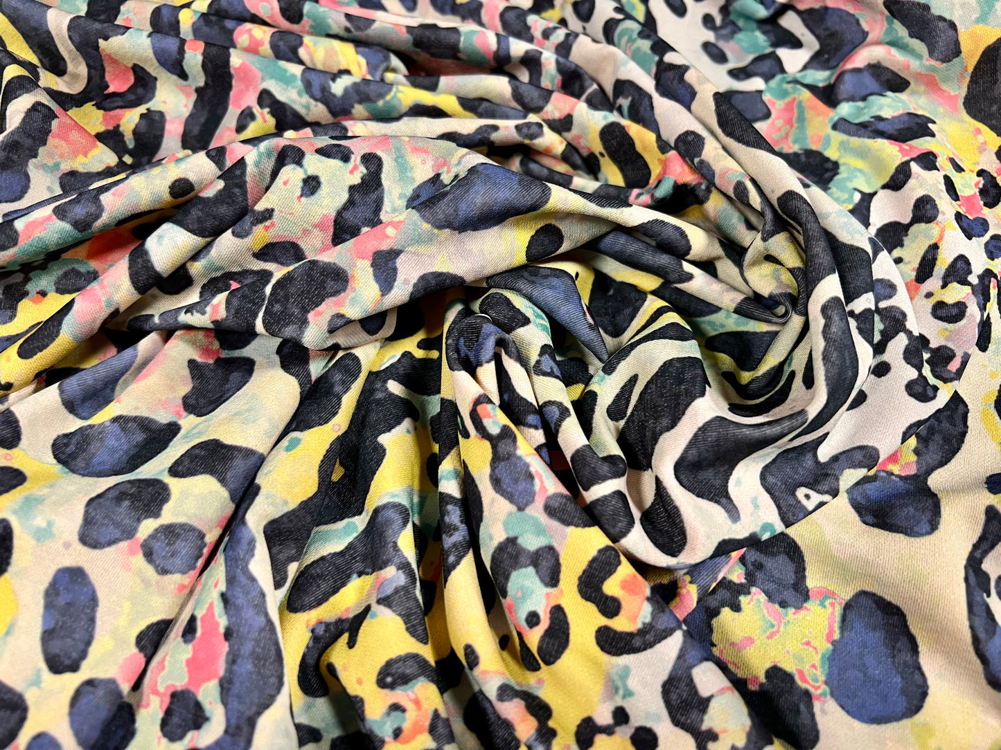 Stretch spandex interlock jersey fabric, per metre - stylised leopard print - blush & multicolour