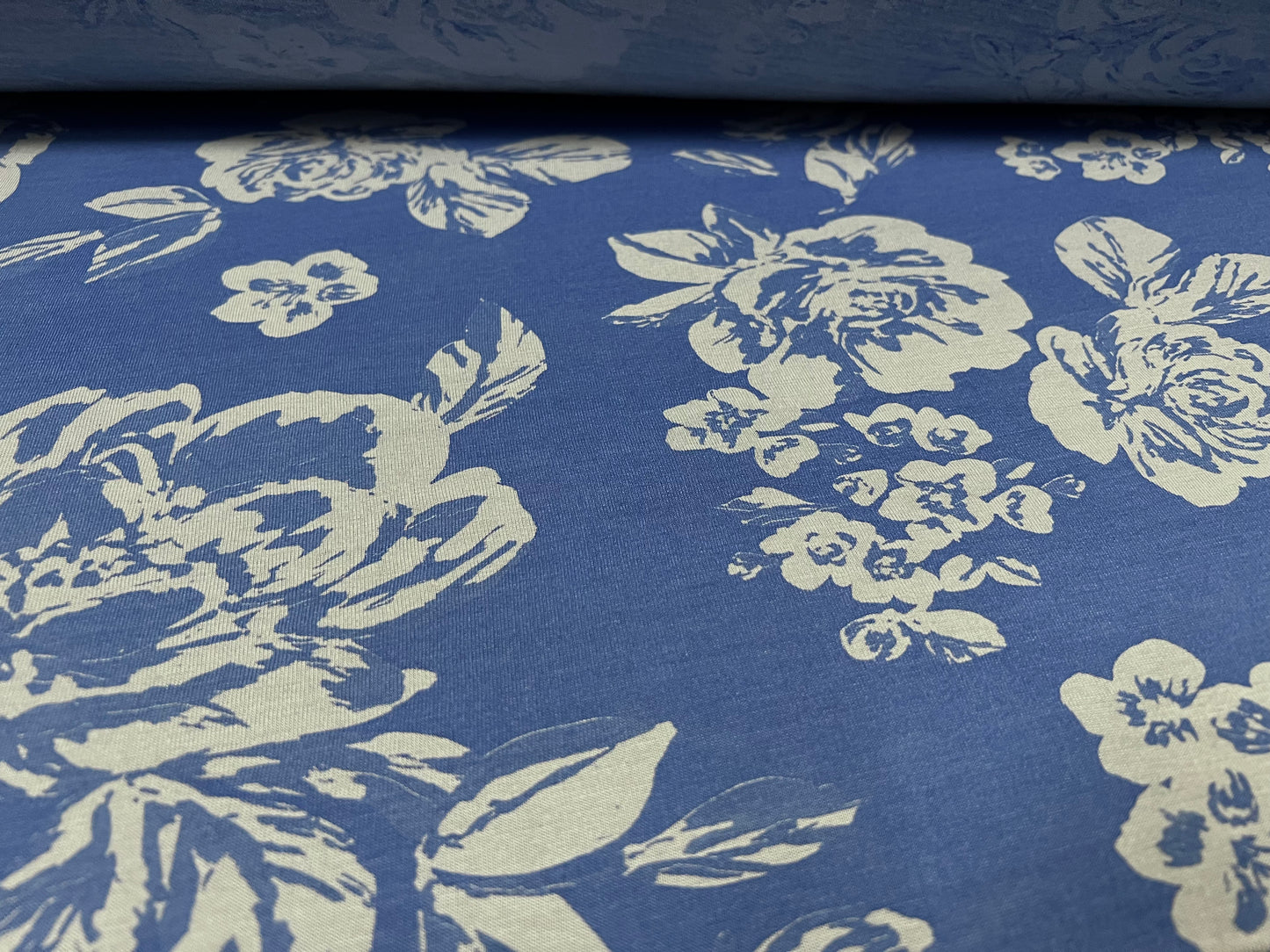 Soft handle stretch single jersey fabric, per metre - rose flower print - blue on blue