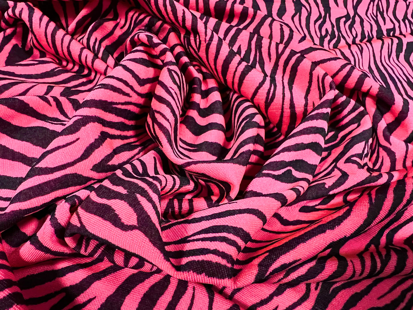 Finely textured stretch spandex single jersey fabric, per metre - zebra animal print - fluorescent pink & black