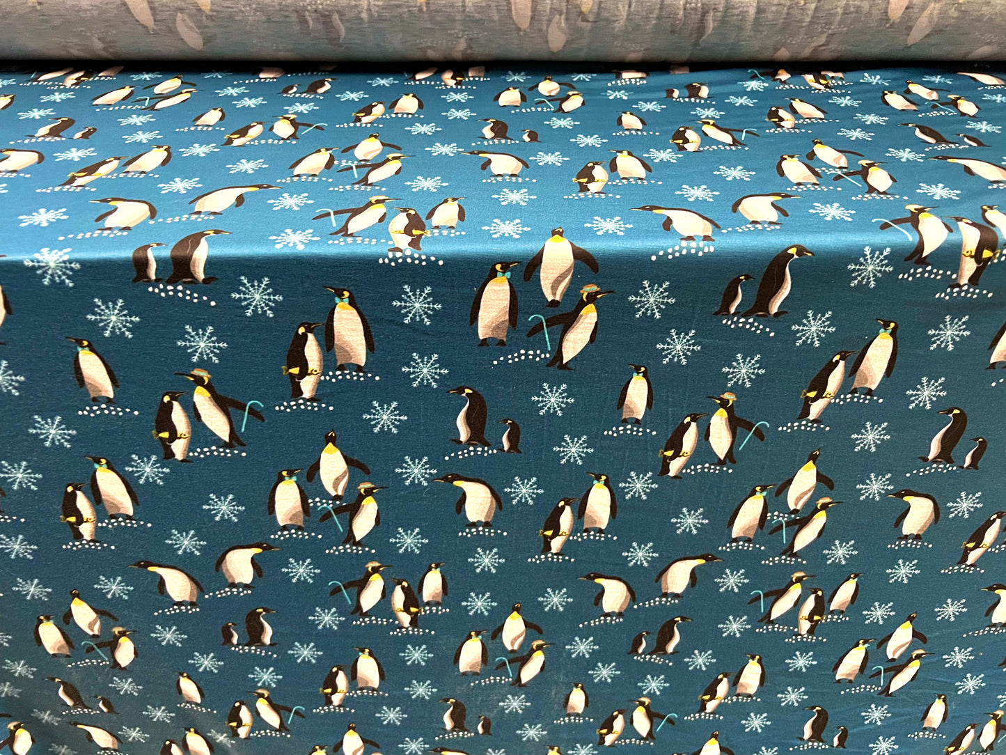 Soft handle stretch single jersey fabric, per metre - penguins print - dark turquoise