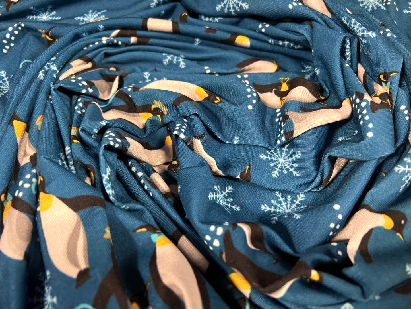 Soft handle stretch single jersey fabric, per metre - penguins print - dark turquoise