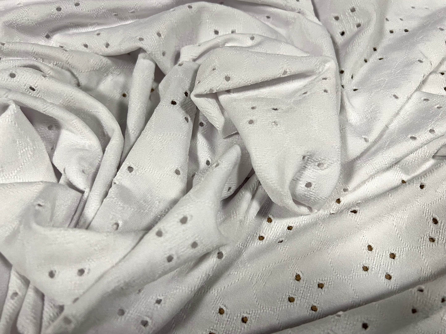 Broderie Anglaise stretch spandex jersey fabric, per metre - white