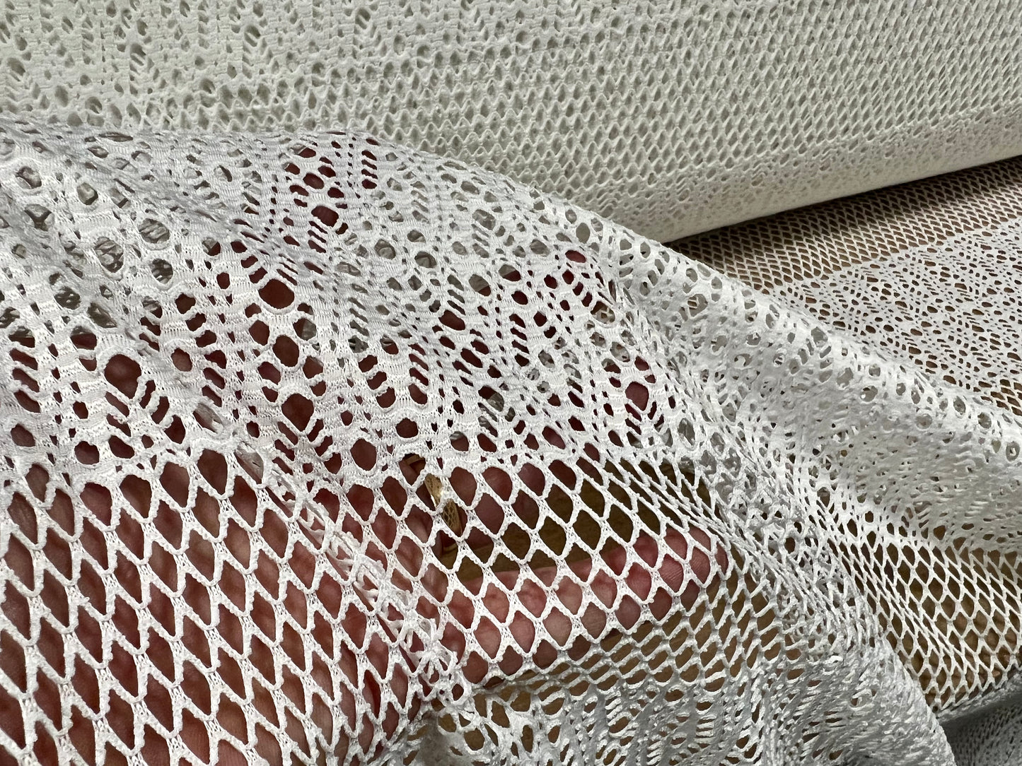 Crochet lace jersey knit fabric, per metre - fishnet stripe - white