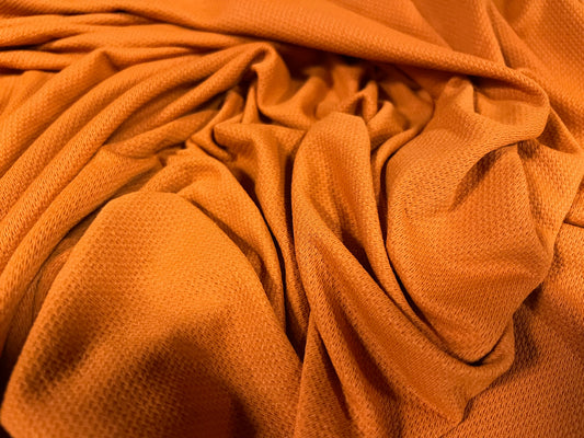 Soft stretch spandex jersey fabric, per metre - micro dobby jacquard - burnt orange