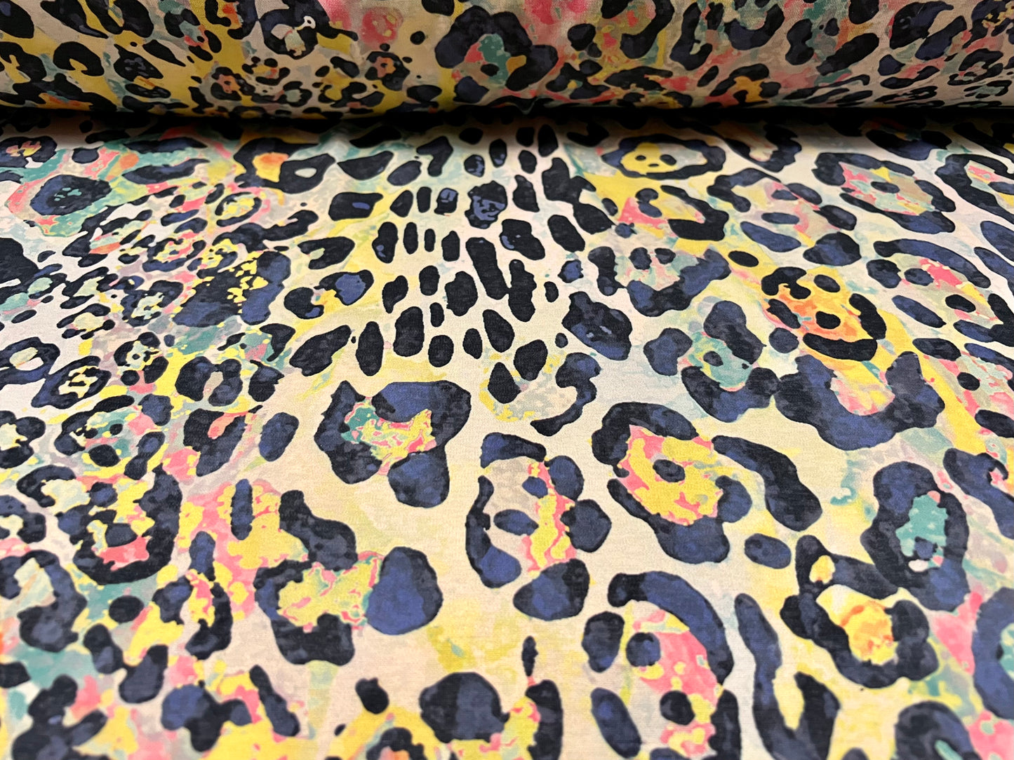 Stretch spandex interlock jersey fabric, per metre - stylised leopard print - blush & multicolour