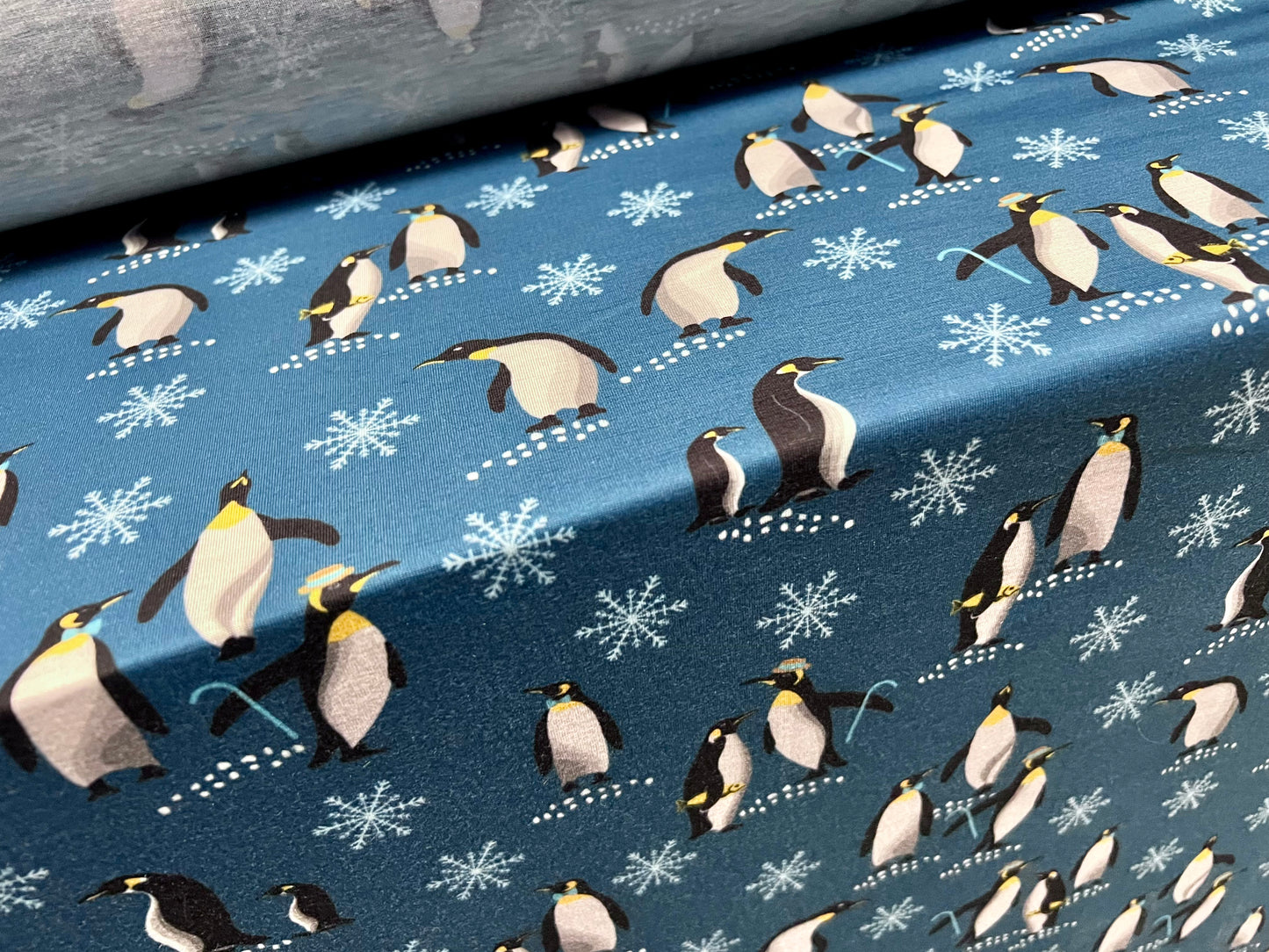 Soft handle stretch single jersey fabric, per metre - penguins print - dark turquoise