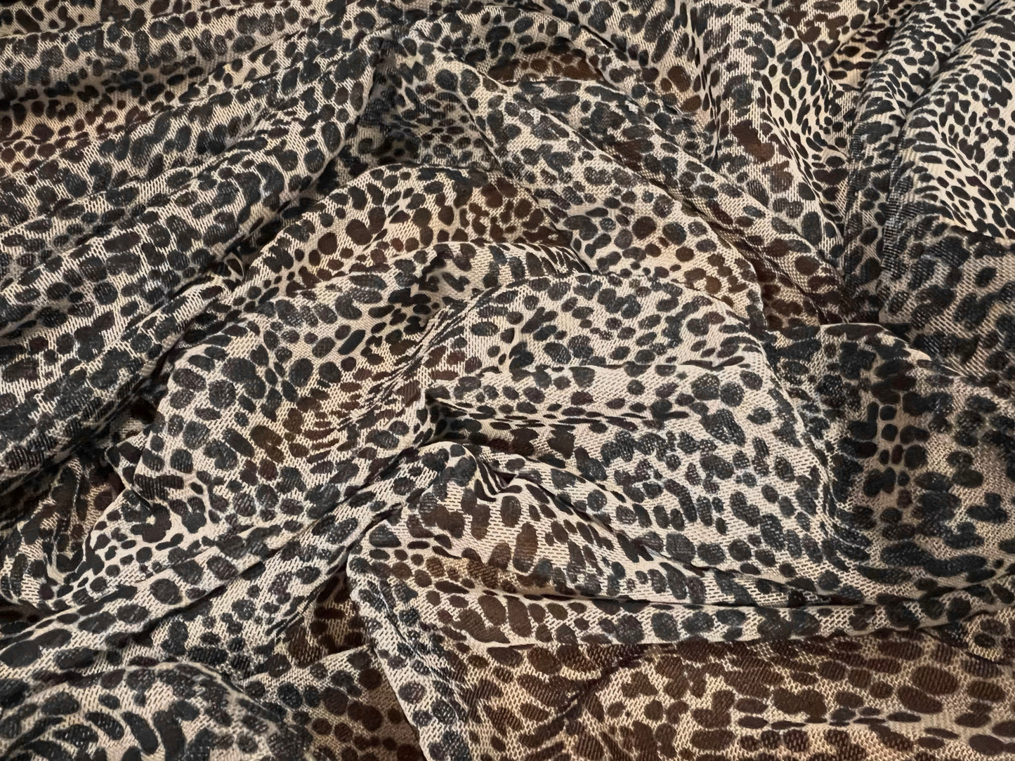 Power mesh net sheer stretch spandex fabric, per metre - small animal print - stone & black