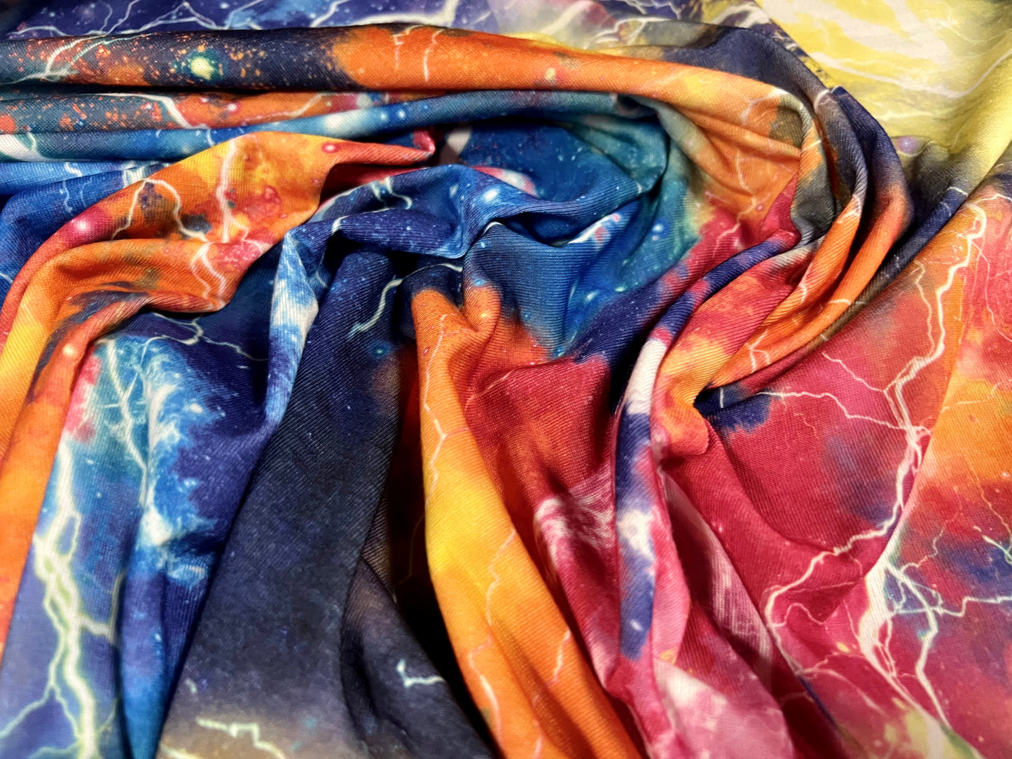 Soft handle stretch single jersey fabric, per metre - cosmic lightning print - multicolour