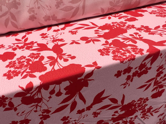 Woven crepe dress fabric, per metre - floral silhouette print - red & pink