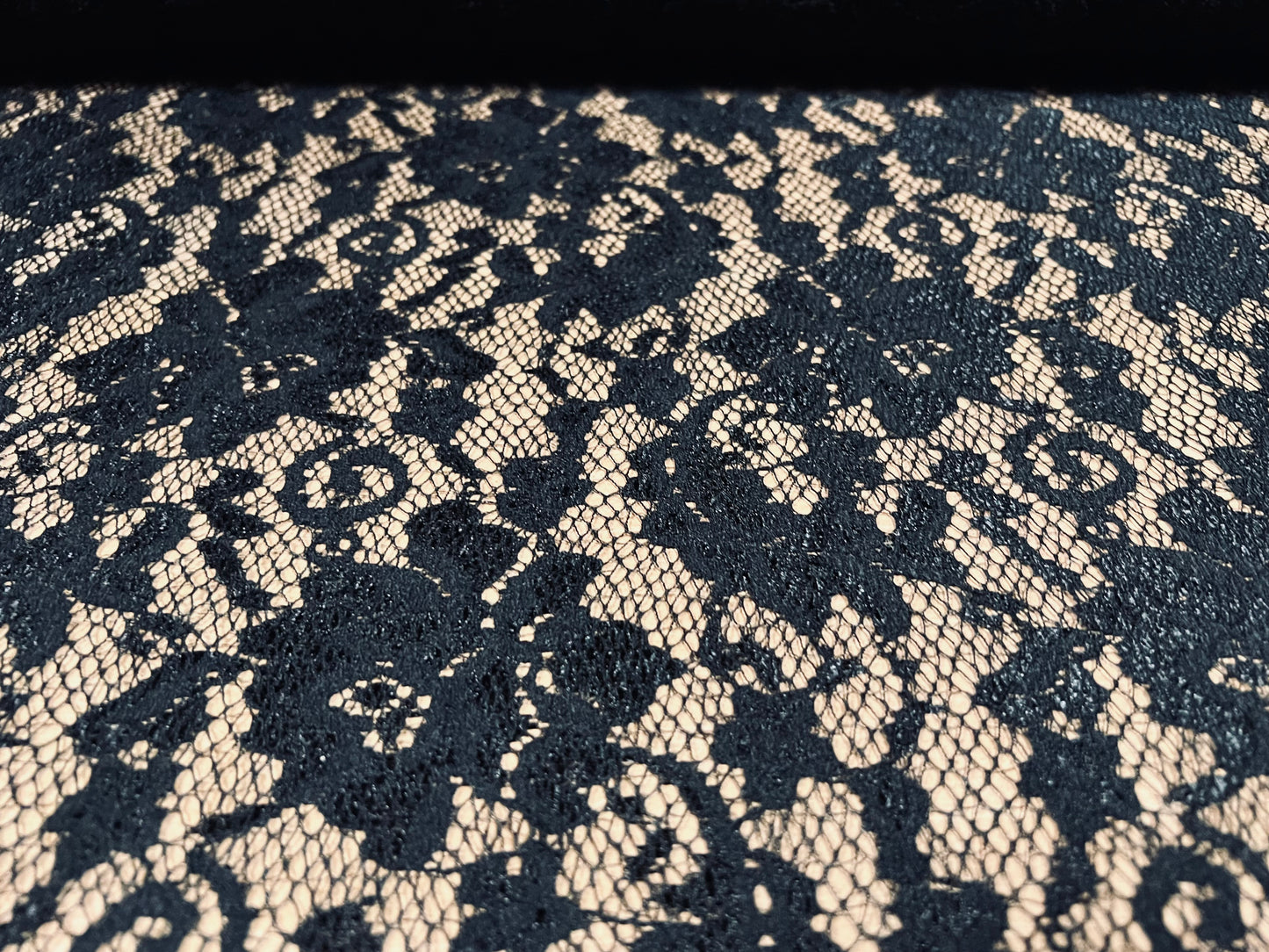 Stretch spandex lace dress fabric with scalloped selvedge, per metre - floral design - black