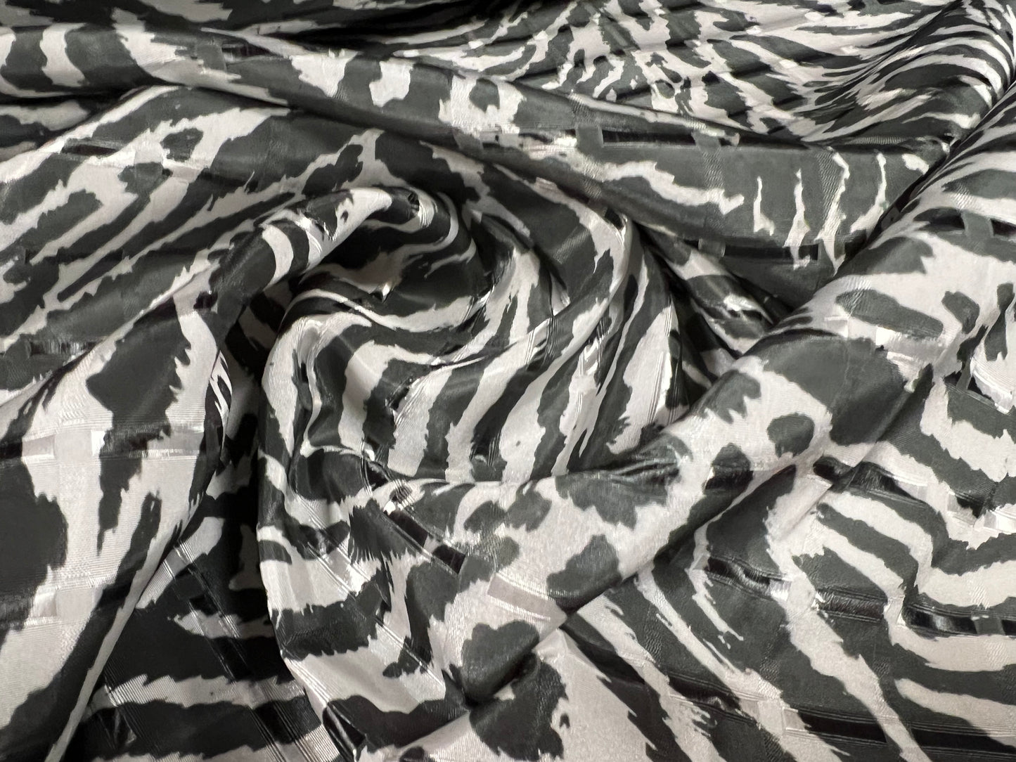 Satin jacquard woven dress fabric, per metre - zebra animal print - charcoal grey & white