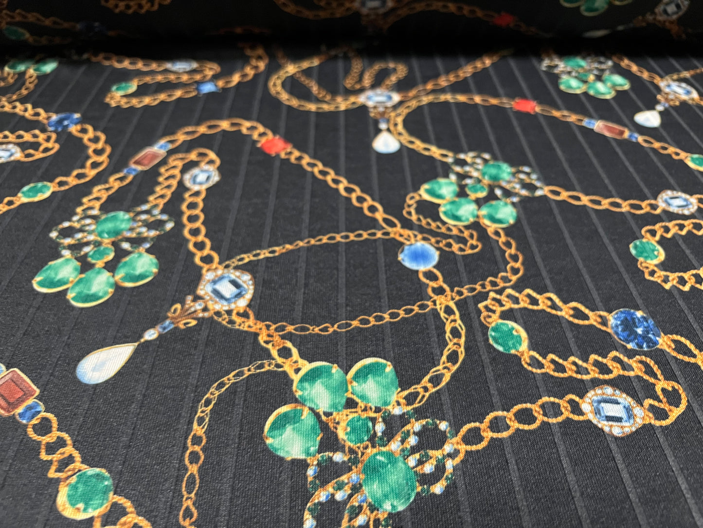 Ribbed stretch spandex jersey fabric, per metre - jewels and gold chains print - black & emerald green