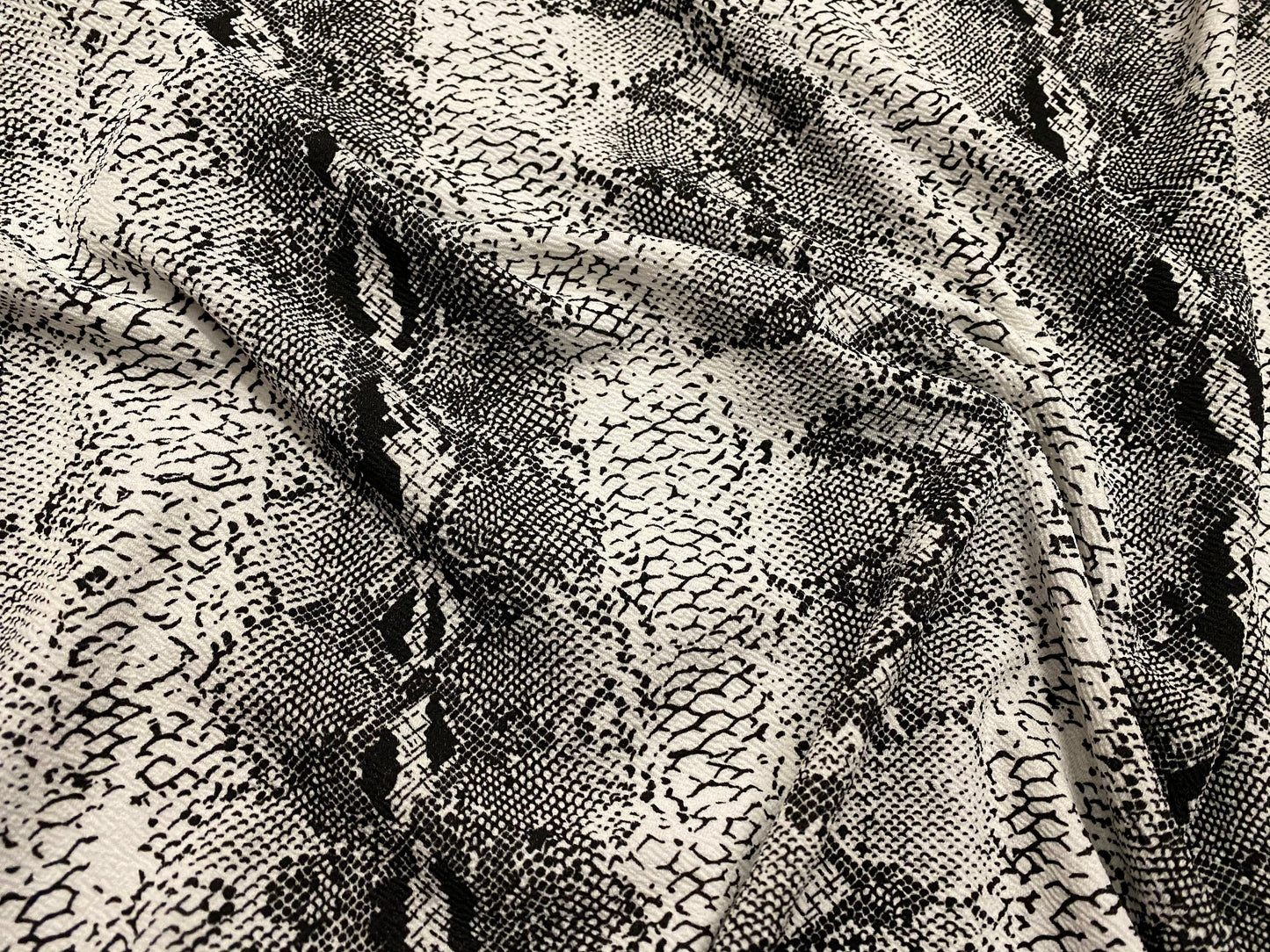 Snakeskin print waterfall textured scuba spandex jersey fabric, per metre