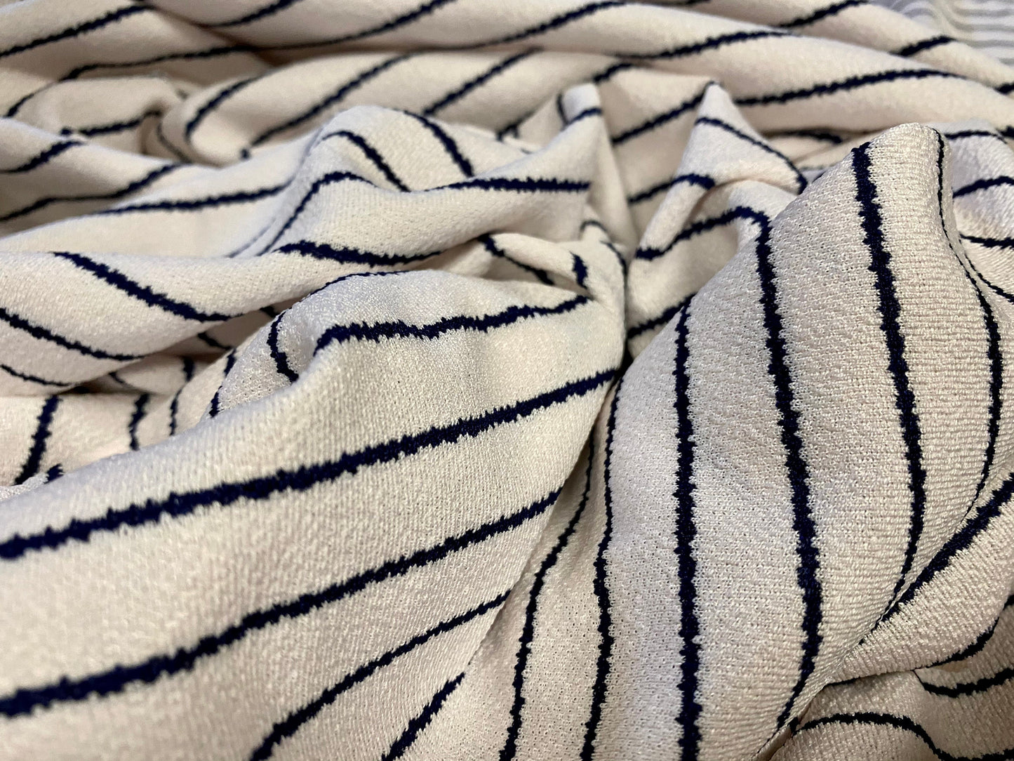 Valentino crepe spandex jersey fabric - similar to scuba - per metre, ivory with navy smudge stripe