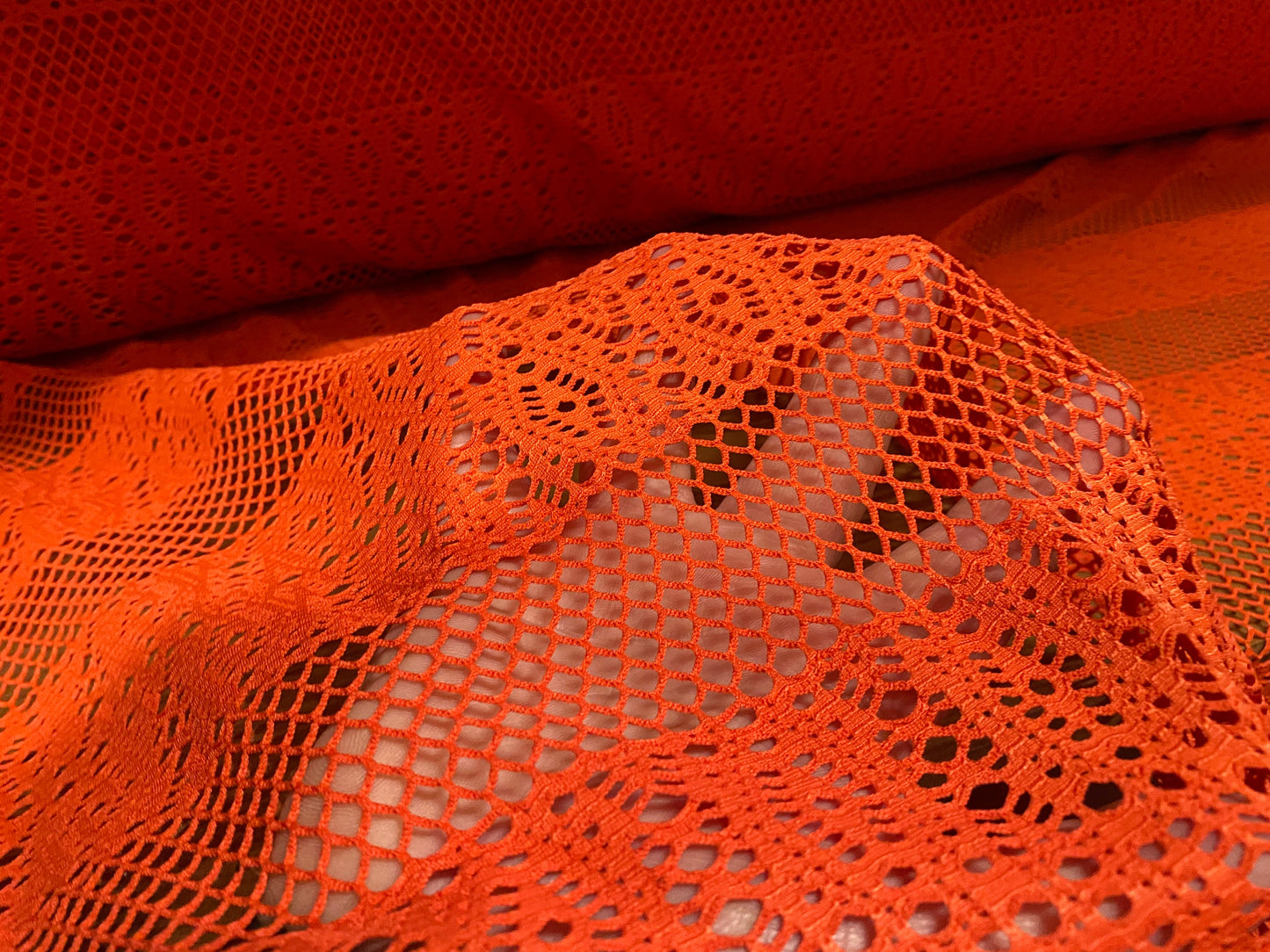 Fishnet stretch mesh floral spandex jersey fabric, per metre - Orange