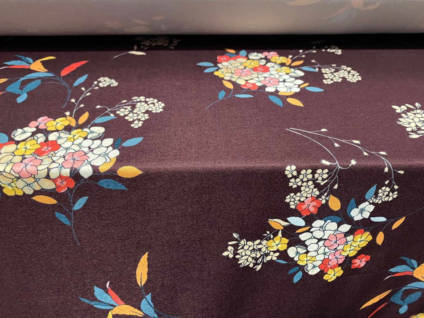 Soft touch stretch spandex jersey fabric, per metre - maroon floral print