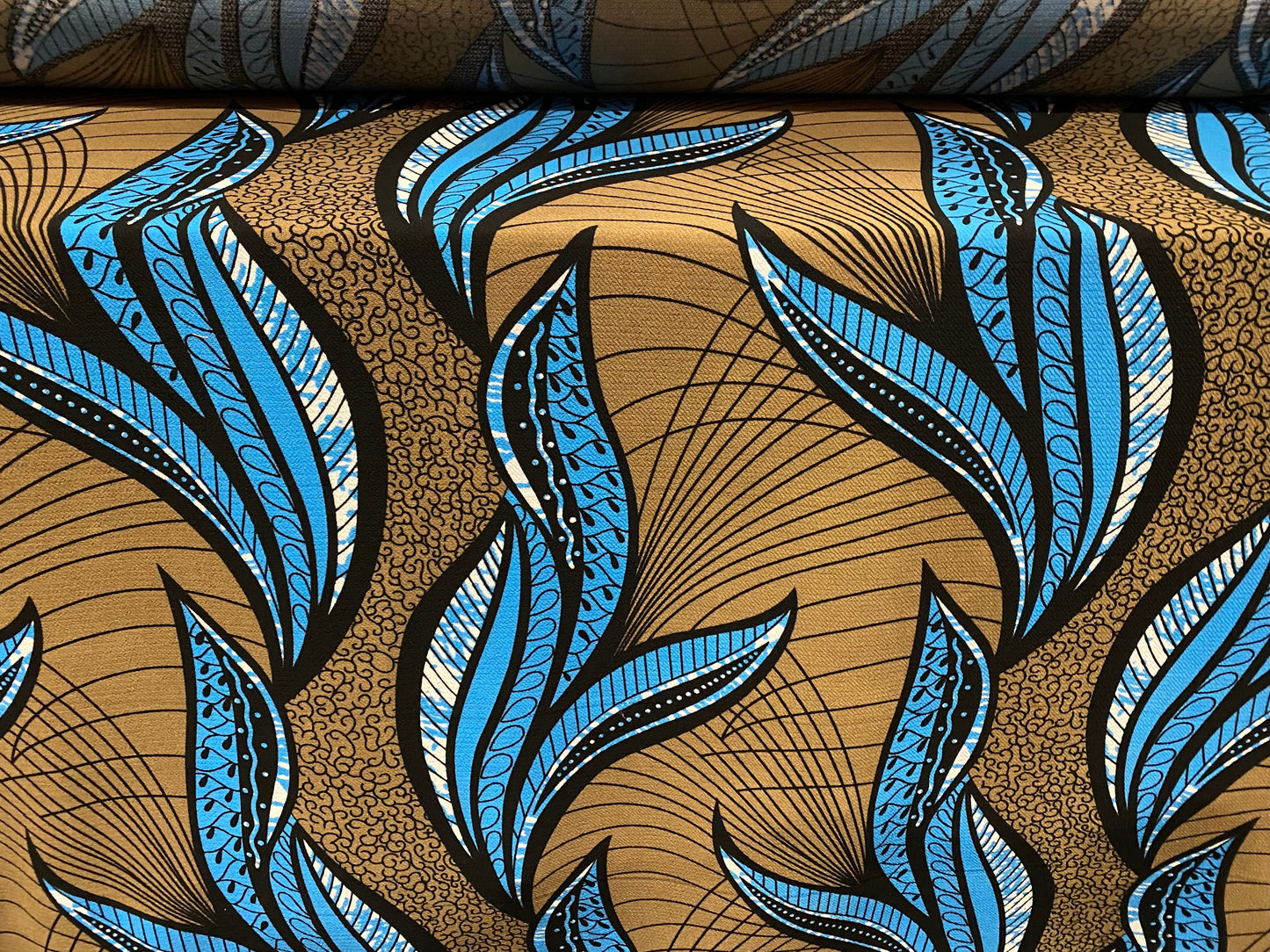 Heavyweight moss crepe woven dress fabric with comfort stretch - large leaf print - light bronze & blue