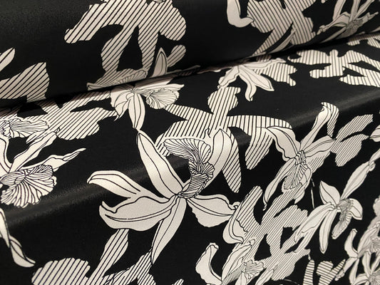 Chirimen woven crepe dress fabric, per metre - lily  flower print - black