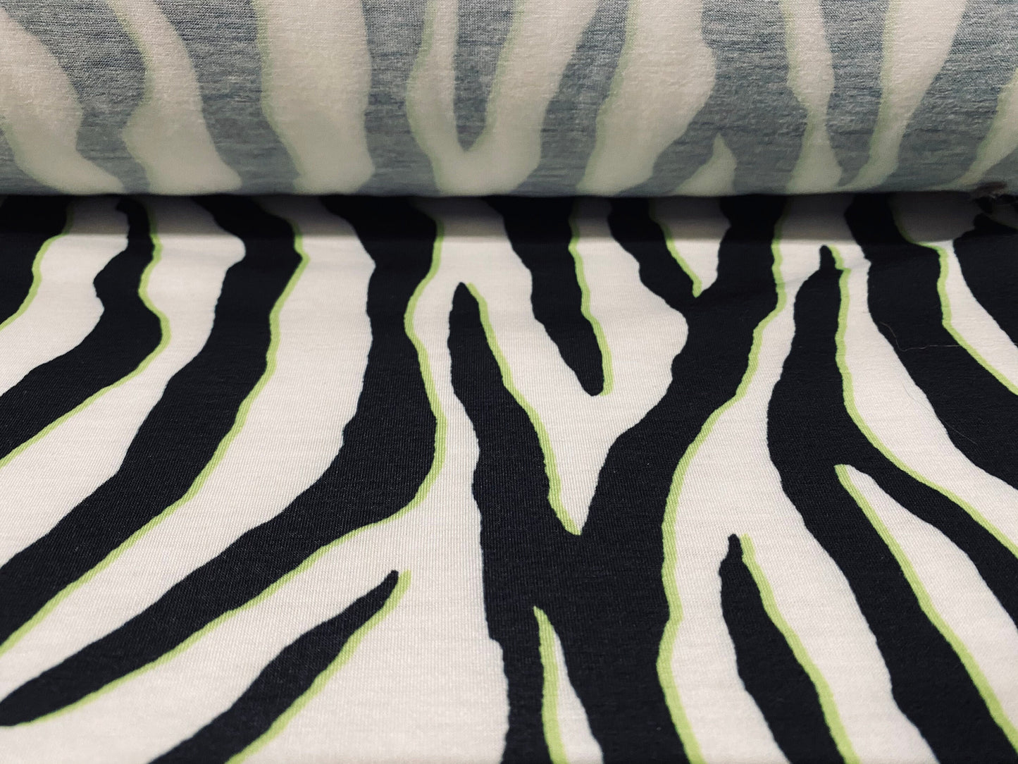 Soft handle jersey dress  fabric, per metre - black white & yellow zebra print